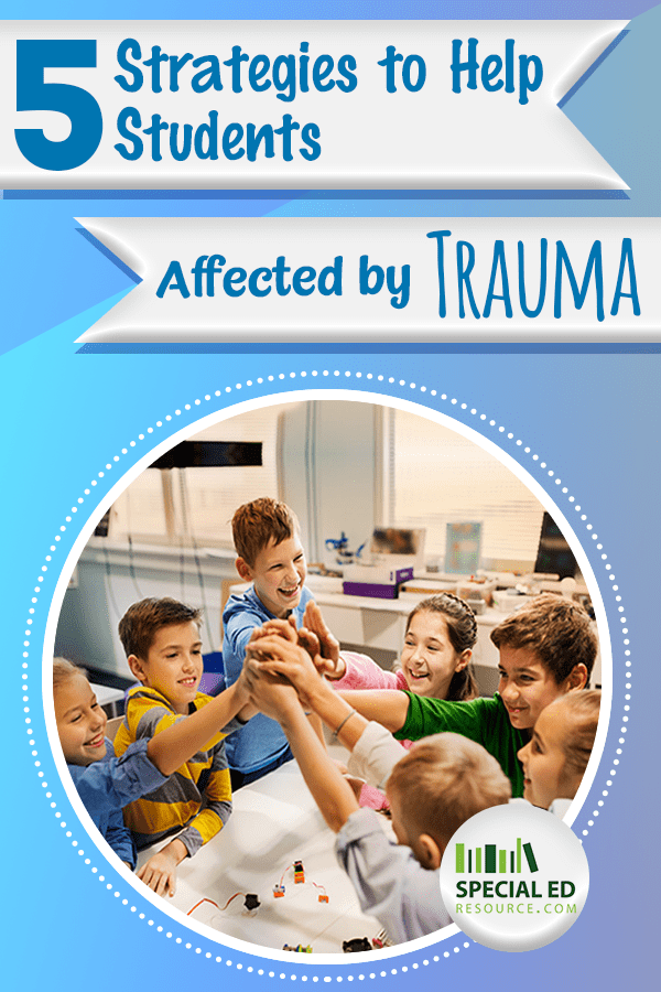 Group of students in the classroom all high fiving each other at the end of one of the 5 strategies the teacher implemented to help students affected by trauma.