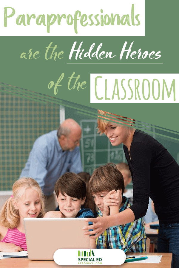 3 students sitting around a computer getting support from their paraprofessionals in their classroom at school.